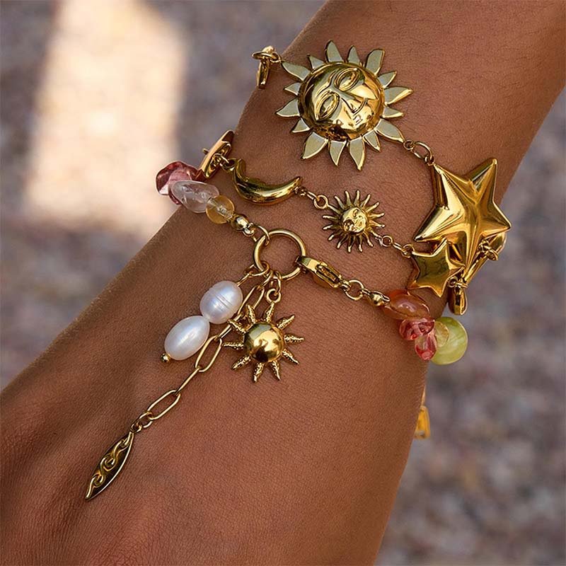 Second image of mixed natural colored gemstone piece with a retro pendant