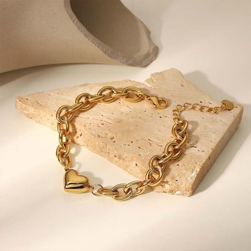 Second image of gold chunky chain heart bracelet